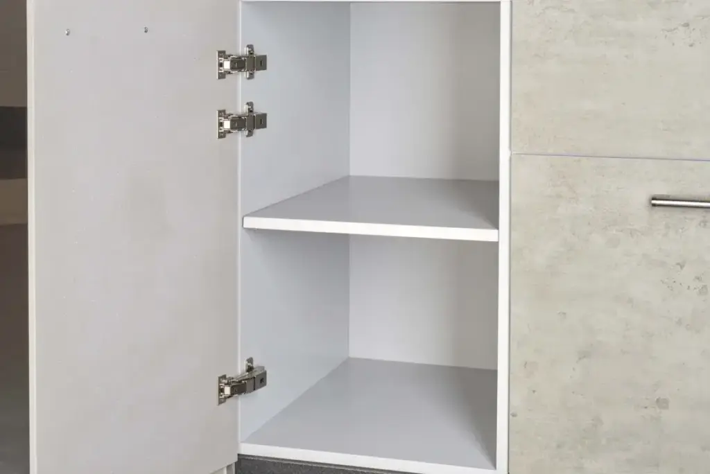 A close up of the cupboard of an outdoor kitchen